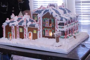 Christmas Chateau snow topped custom gingerbread mansion in Wisconsin